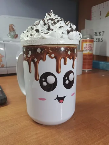 Smiling handmade mug with a chocolate-drizzle and whipped-cream-style topper